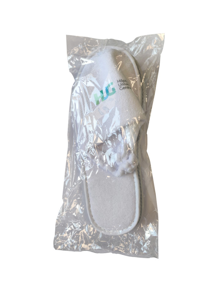 Pantoufles imprimées à élastique logo HUG - Carton de 50 sachets de 1 paire